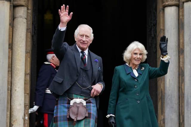 King Charles III and the Queen Consort wave as they leave Dunfermline Abbey, after a visit to mark its 950th anniversary, and after attending a meeting at the City Chambers in Dunfermline, Fife, where the King formally marked the conferral of city status on the former town.