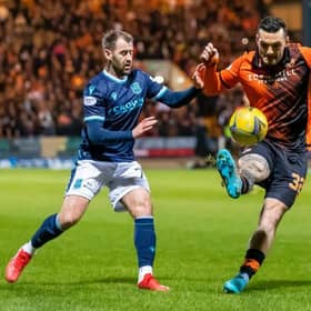 Dundee winger Niall McGinn (left) and Dundee United striker Tony Watt in action during the 0-0 draw between the teams at Dens Park. (Photo by Roddy Scott / SNS Group)