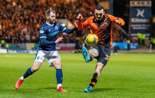 Dundee winger Niall McGinn (left) and Dundee United striker Tony Watt in action during the 0-0 draw between the teams at Dens Park. (Photo by Roddy Scott / SNS Group)