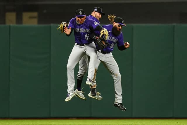 Yonathan Daza, Garrett Hampson and Charlie Blackmon of the Colorado Rockies celebrate beating the San Francisco Giants. Picture: Daniel Shirey/Getty Images