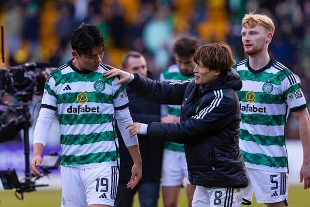 Celtic's Oh Hyeon-gyu and Kyogo Furuhashi at full time following Celtic's 3-1 win at St Johnstone.