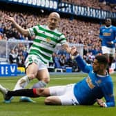 GLASGOW, SCOTLAND - APRIL 03: Celtic's Daizen Maeda (L) competes with Rangers' Leon Balogun during a cinch Premiership match between Rangers and Celtic at Ibrox Stadium, on April 02, 2022, in Glasgow, Scotland.  (Photo by Craig Williamson / SNS Group)