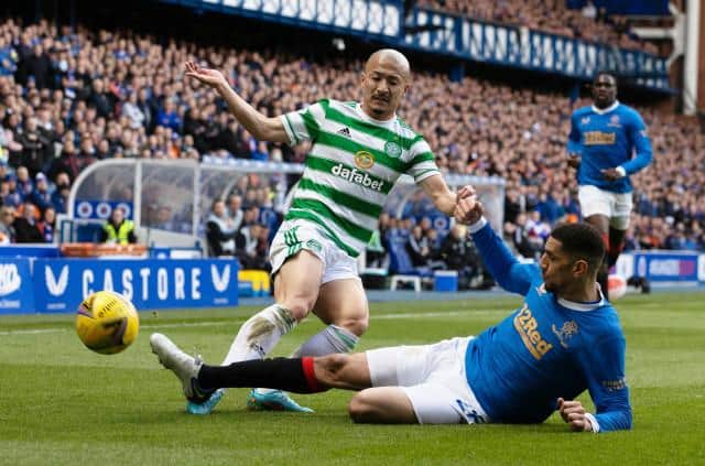 GLASGOW, SCOTLAND - APRIL 03: Celtic's Daizen Maeda (L) competes with Rangers' Leon Balogun during a cinch Premiership match between Rangers and Celtic at Ibrox Stadium, on April 02, 2022, in Glasgow, Scotland. (Photo by Craig Williamson / SNS Group)