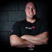 Mitchell Hooper, a Canadian strongman, surprised fans worldwide by taking the title of World's Strongest Man in the 2023 contest.