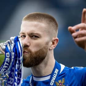 St Johnstone match-winner Shaun Rooney lifts with the Betfred Cup after his header was the difference in a 1-0 win over Livingston. (Photo by Craig Williamson / SNS Group)