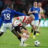 Rangers' Glen Kamara (left) and PSV Eindhoven's Philipp Max battle for the ball.