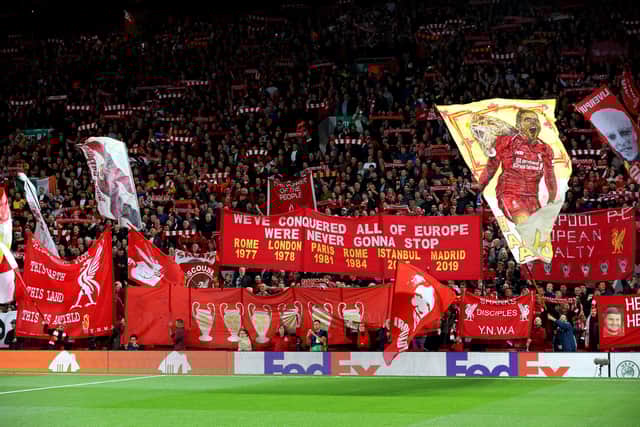 Liverpool fans show their support with flags and banners prior to the UEFA Champions League Group A match against Rangers