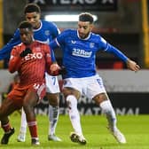 Aberdeen's Luis Lopes (L) and Rangers' Connor Goldson challenge for the ball during the previous meeting at Pittodrie in December.  (Photo by Craig Foy / SNS Group)