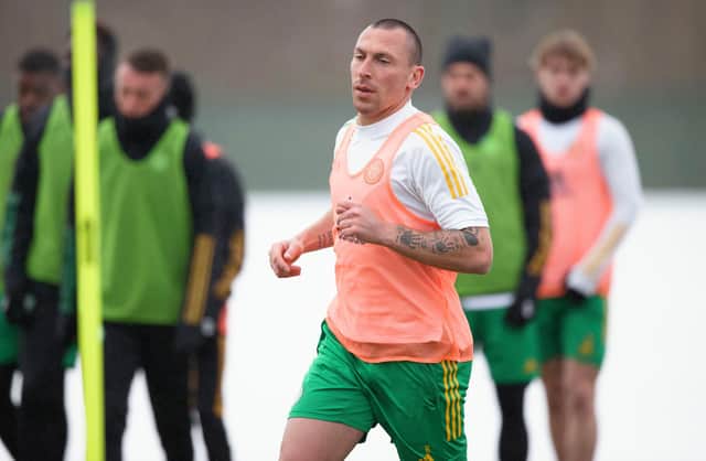Celtic captain Scott Brown back training at Lennoxtown and doing what loves following 10-day isolation period. / SNS Group)