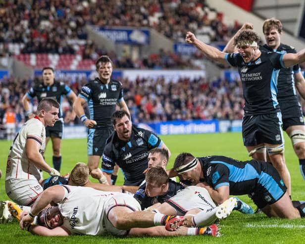 Rory Darge, right, celebrates as Johnny Matthews scores Glasgow's second try. Picture: James Crombie/INPHO/Shutterstock