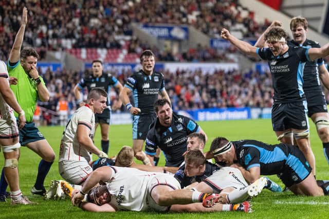 Rory Darge, right, celebrates as Johnny Matthews scores Glasgow's second try. Picture: James Crombie/INPHO/Shutterstock