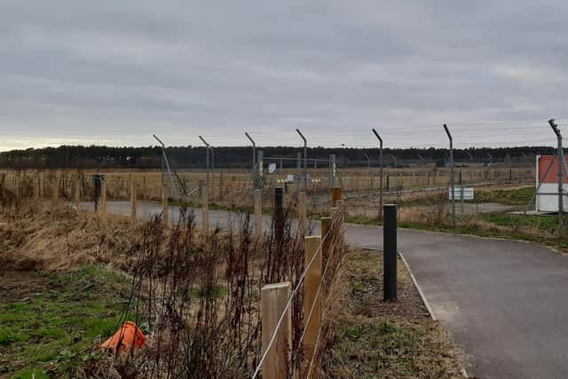 The new path connecting the station to the airport winds round the western end of the runway. Picture: The Scotsman