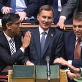 Prime Minister Rishi Sunak congratulates Chancellor of the Exchequer Jeremy Hunt after he delivered his autumn statement to MPs in the House of Commons, London. Picture date: Thursday November 17, 2022.