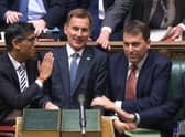 Prime Minister Rishi Sunak congratulates Chancellor of the Exchequer Jeremy Hunt after he delivered his autumn statement to MPs in the House of Commons, London. Picture date: Thursday November 17, 2022.