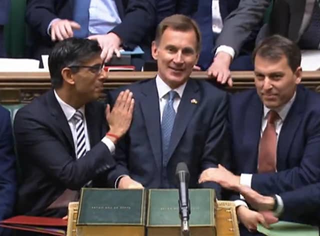 Prime Minister Rishi Sunak congratulates Chancellor of the Exchequer Jeremy Hunt after he delivered his autumn statement to MPs in the House of Commons, London. Picture date: Thursday November 17, 2022.