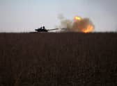 A Ukrainian tank fires toward Russian position near the town of Bakhmut, Donetsk region on January 26, 2023, amid the Russian invasion of Ukraine. (Photo by Anatolii Stepanov / AFP)