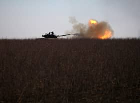 A Ukrainian tank fires toward Russian position near the town of Bakhmut, Donetsk region on January 26, 2023, amid the Russian invasion of Ukraine. (Photo by Anatolii Stepanov / AFP)