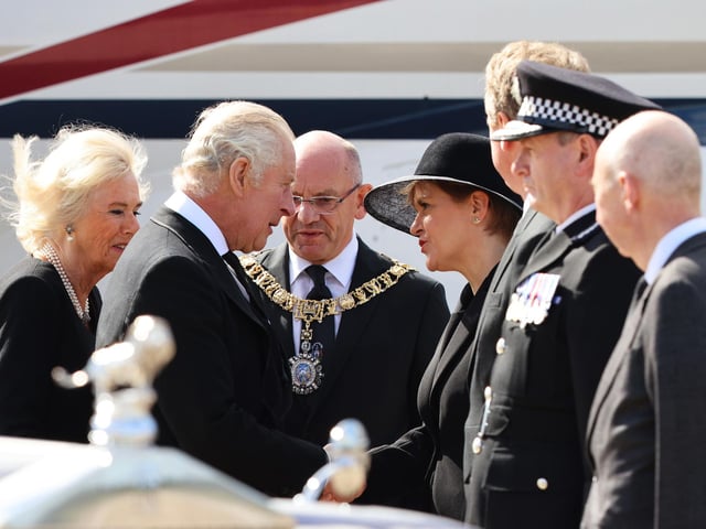King Charles III and the Queen Consort (left) are greeted by First Minister Nicola Sturgeon as they arrive at Edinburgh Airport after travelling from London, ahead of joining the procession of Queen Elizabeth's coffin from the Palace of Holyroodhouse to St Giles' Cathedral, Edinburgh. Picture date: Monday September 12, 2022.