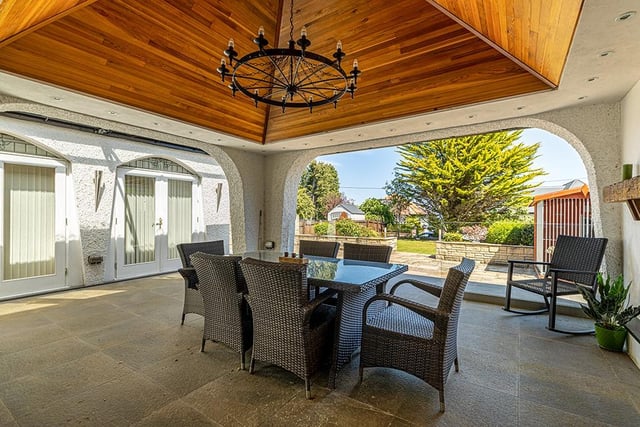 Exterior: The exceptional enclosed gardens are entered via electric gates. An outdoor pavilion has a fireplace for evening entertaining.