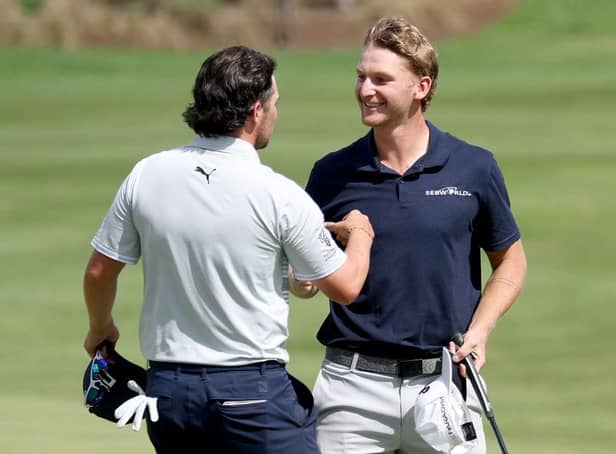 Ewen Ferguson congratulates Nick Bachem after the German's impresive win in the Jonsson Workwear Open at The Club at Steyn City in South Africa. Picture: Warren Little/Getty Images.