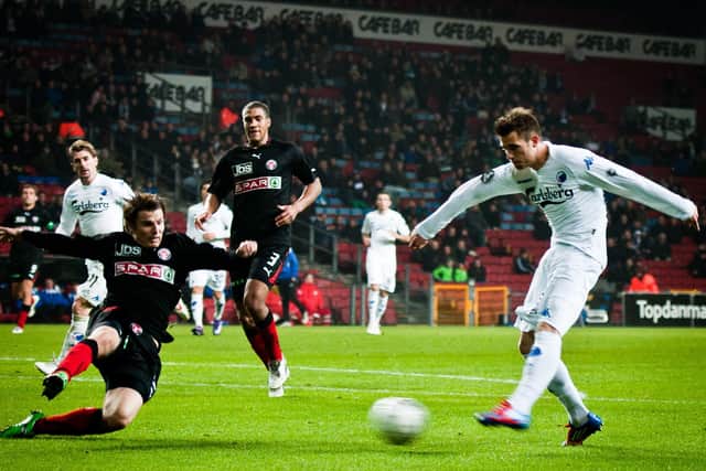 Anders Povlsen has recently bought FC Midtjylland, pictured here in black, one of Denmark's most successful football clubs. PIC: Creative Commons.