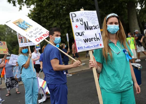 Nearly four out of ten nurses are thinking of leaving with calls for better staffing levels and pay (Picture: Isabel Infantes/AFP via Getty Images)