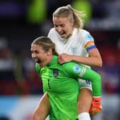 Mary Earps and Leah Williamson celebrate after their team's third goal in the Women's Euro 2022 Semi Final match between England and Sweden at Bramall Lane. (Photo by Harriet Lander/Getty Images)