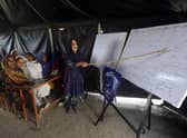 Flood affected children attend makeshift school organized by Islamic group Jamaat-e-Islami Pakistan, in Sukkur, Pakista. (AP Photo/Fareed Khan, File)