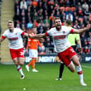 Clark Robertson celebrates scoring for Rotherham United against former club Blackpool in 2019. Picture: SNS