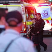 Police cordon off the Westfield Bondi Junction shopping mall (Photo by DAVID GRAY / AFP)
