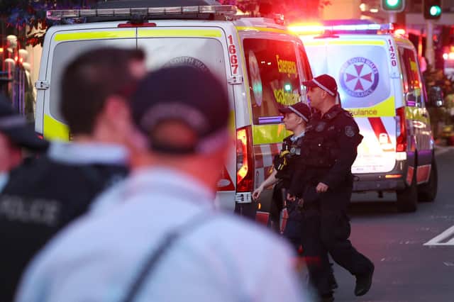 Police cordon off the Westfield Bondi Junction shopping mall (Photo by DAVID GRAY / AFP)