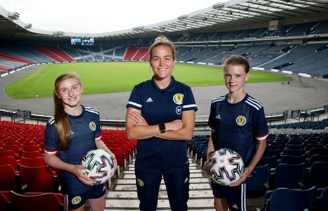 Scotland goalkeeper Lee Alexander is pictured with two young supporters during a Girls’ and Women’s Strategy Launch at Hampden on July 22, 2021, in Glasgow, Scotland. (Photo by Craig Williamson / SNS Group)
