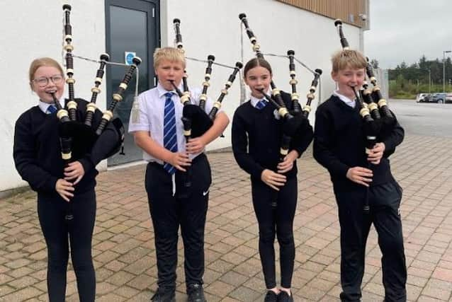 Alford pupils with their new pipes