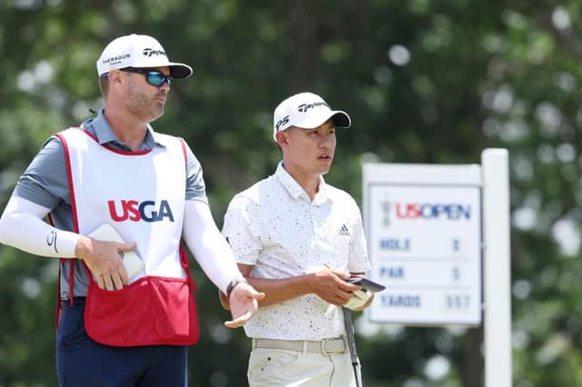 Collin Morikawa talks with caddie Jonathan Jakovac on the ninth tee during the second round of the 122nd US Open at The Country Club in Brookline. Picture: Warren Little/Getty Images.