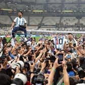 Lionel Messi leads the Argentina celebrations after the victory over France in the World Cup final.