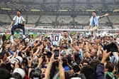 Lionel Messi leads the Argentina celebrations after the victory over France in the World Cup final.