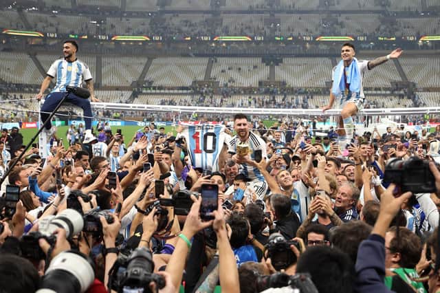 Lionel Messi leads the Argentina celebrations after the victory over France in the World Cup final.