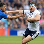 Scotland's Hamish Watson and France's Brice Dulin during the match at Murrayfield.