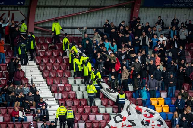 Dundee fans had to be held back by stewards after equalising at Tynecastle.
