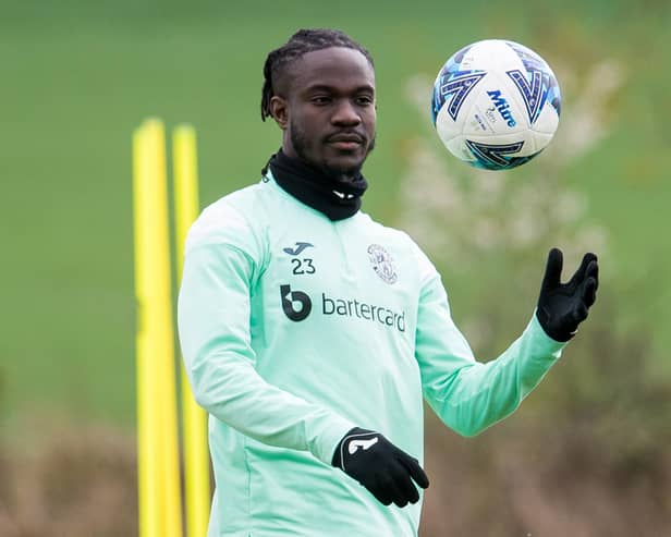 Elie Youan has signed a permanent deal with Hibs for the next three seasons.