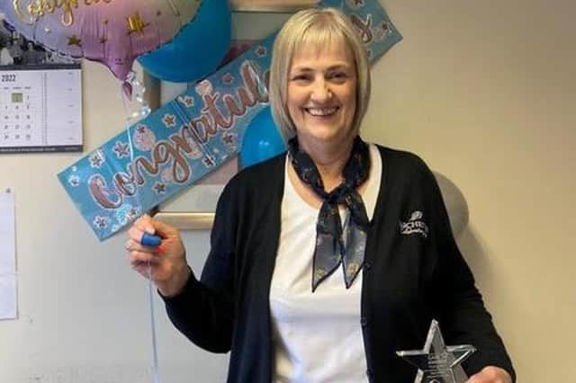 Susan Simpson with her award