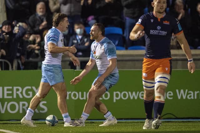 Glasgow's Josh McKay (L) celebrates scoring a try with Tom Gordon during a United Rugby Championship match between Glasgow Warriors and Edinburgh Rugby at Scotstoun Stadium, on March 18, 2022, in Glasgow, Scotland. (Photo by Ross MacDonald / SNS Group)