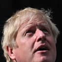 Britain's then prime minister Boris Johnson looks up as he delivers a speech in front of 10 Downing Street in central London. Picture: Ben Stansall/AFP via Getty Images