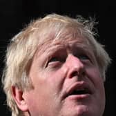 Britain's then prime minister Boris Johnson looks up as he delivers a speech in front of 10 Downing Street in central London. Picture: Ben Stansall/AFP via Getty Images