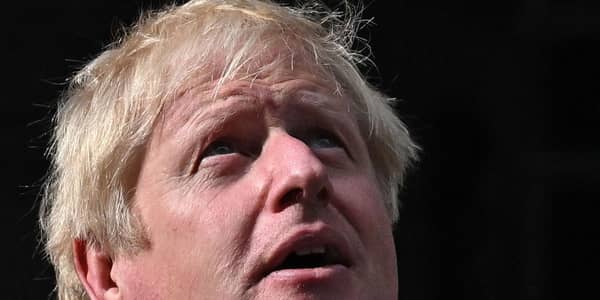 Britain's then prime minister Boris Johnson looks up as he delivers a speech in front of 10 Downing Street in central London. Picture: Ben Stansall/AFP via Getty Images