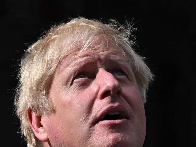Britain's then prime minister Boris Johnson looks up as he delivers a speech in front of 10 Downing Street in central London. Picture: Ben Stansall/AFP via Getty Images