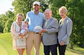 Scottie Scheffler celebrates his win in the Memorial Tournament presented by Workday with wife Meredith, son Bennett Scheffler, tournament host Jack Nicklaus and Barbara Nicklaus at Muirfield Village Golf Club in Dublin, Ohio. Picture: Michael Reaves/Getty Images.