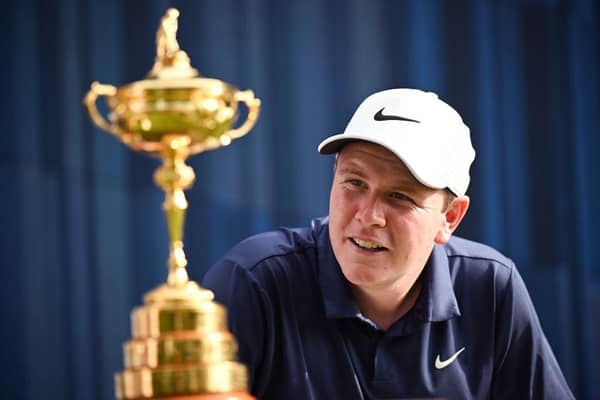 Bob MacIntyre gazes at the Ryder Cup trophy during the pro-am prior to the BMW International Open at Golfclub Munchen Eichenried in June 21. Picture: Stuart Franklin/Getty Images.