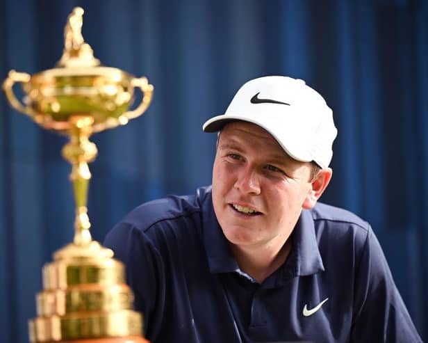 Bob MacIntyre gazes at the Ryder Cup trophy during the pro-am prior to the BMW International Open at Golfclub Munchen Eichenried in June 21. Picture: Stuart Franklin/Getty Images.