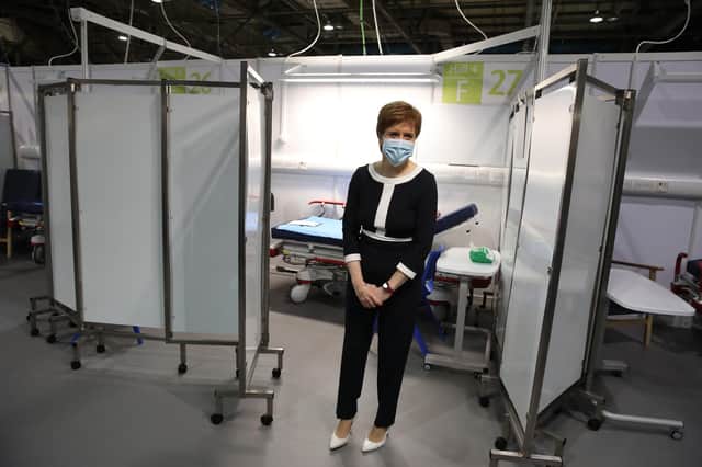 First Minister Nicola Sturgeon views a cubicle during a visit to the NHS Louisa Jordan at the SEC.